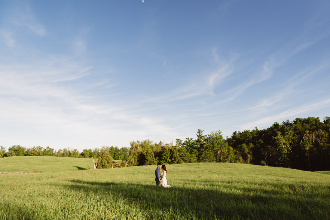 Wide shot of couple in field of tall grass | Scotsdale Farm Engagement, Georgetown | Toronto Wedding Photographer | EightyFifth Street Photography