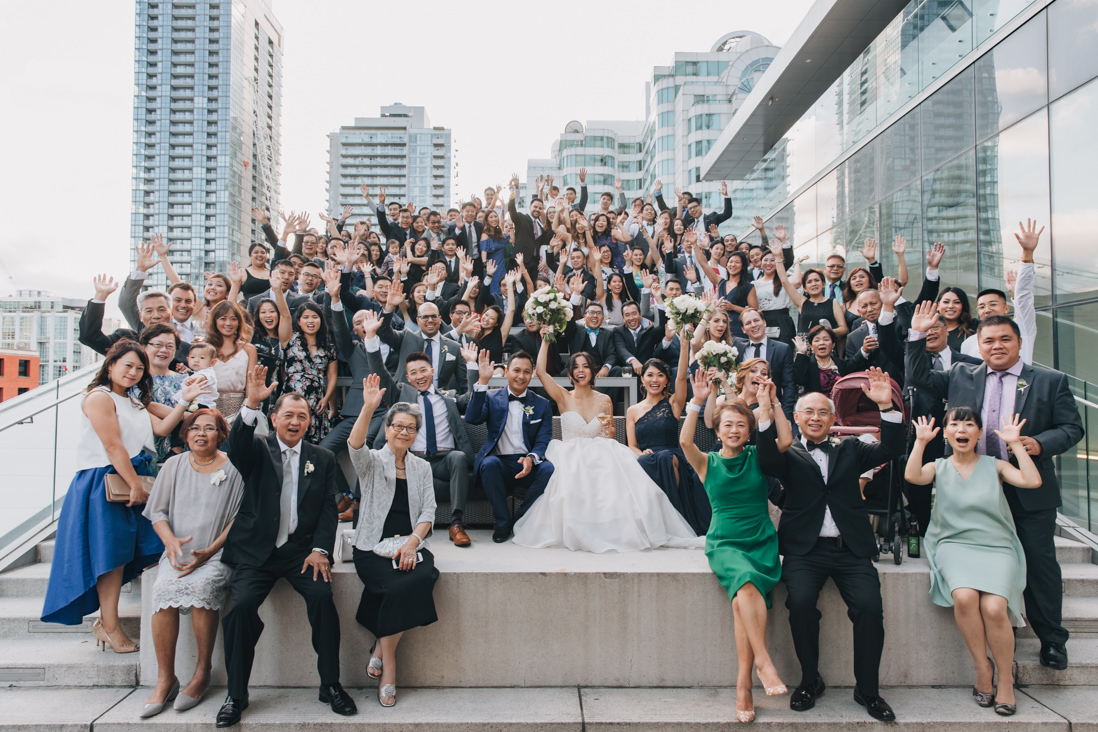massive group photo of all guests on terrace at malaparte wedding toronto