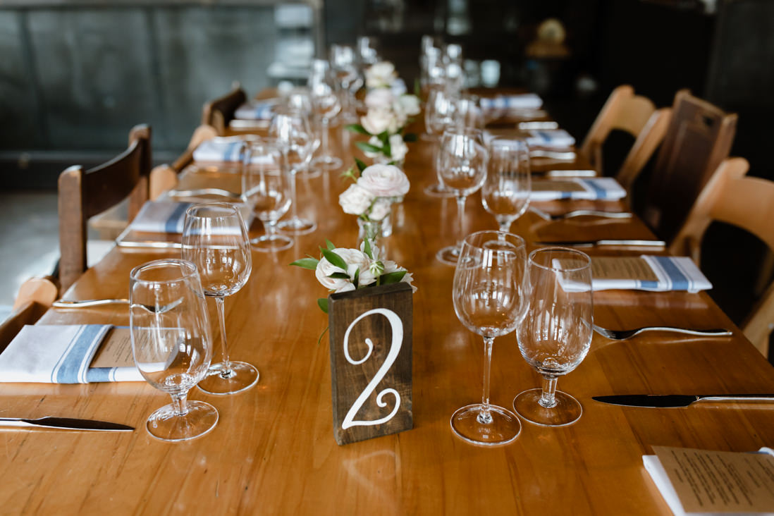 wedding reception decor table wood numbers Propeller Coffee Co Wedding Toronto_EightyFifth Street Photography
